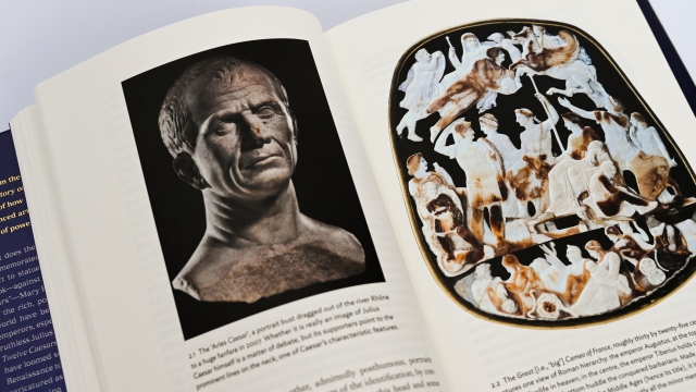 Twelve Caesars open book showing illustrations and text on facing pages