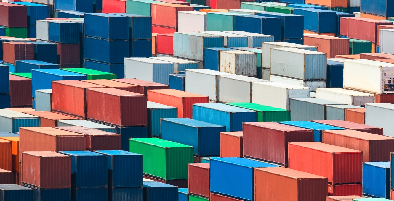 Stacks of colorful shipping containers