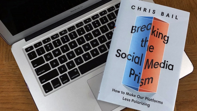 Breaking the Social Media Prism book with computer
