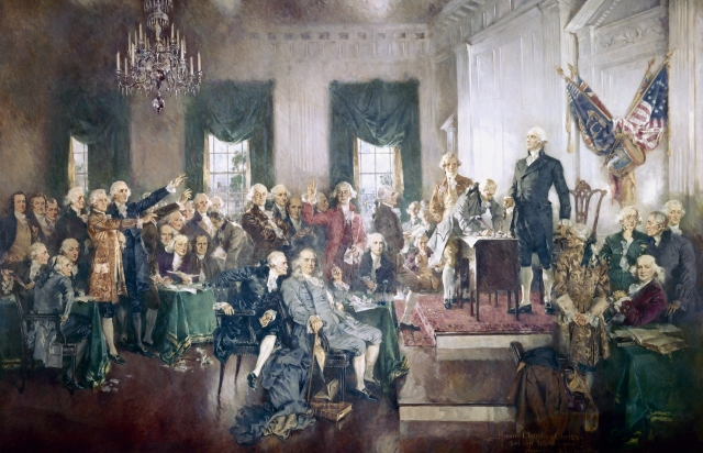 The painting “Scene at the Signing of the Constitution of the United States” by Howard Chandler Christy. The painting depicts Independence Hall in Philadelphia on September 17, 1787. 