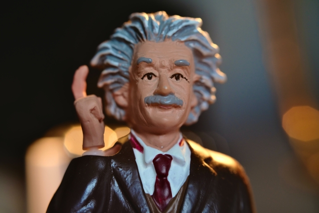 Close-up photograph of a figurine of Einstein