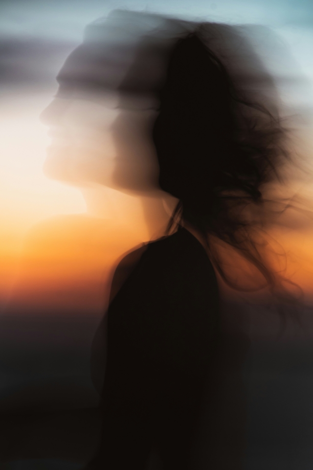 Abstract long-exposure portrait of woman.