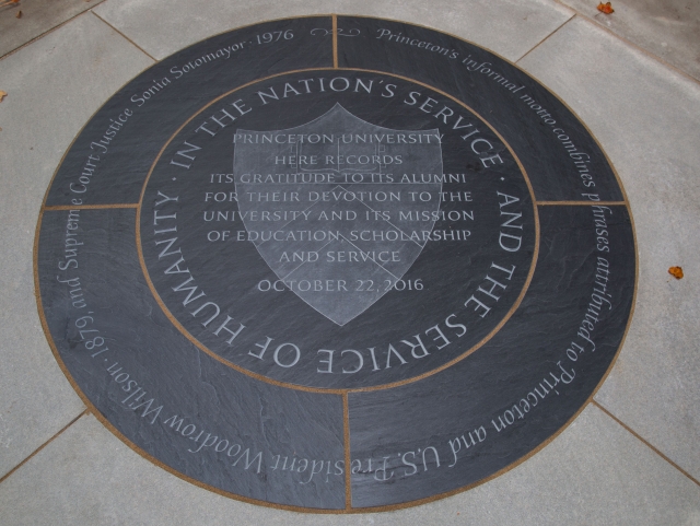 Princeton University’s informal motto—Princeton in the Nation’s Service and the Service of Humanity—is engraved in this stone medallion on the front campus along with an expression of appreciation to alumni for “their devotion to the University and its mission of education, scholarship and service.” Photo by Danielle Alio, Office of Communications, Princeton University.