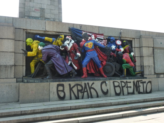 A photograph showing the Red Army Monument spray painted so that the figures resemble fictional characters