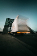 Truck driving on bridge